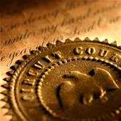 Golden circuit court seal. Shallow focus on the word court.